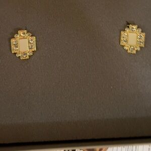 Faux diamond earrings-clip on. Heidi Daus.
New in box. Never worn.